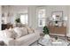 Comfortable living room with stylish furnishings, neutral tones, and natural lighting at 707 Alma Square Dr, Moncks Corner, SC 29461
