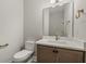Bathroom with modern sink, and neutral walls, toilet and vanity and beautiful black and white floor tile at 709 Oakridge View Trl, Ridgeville, SC 29472