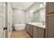 Beautiful bathroom with a modern sink, vanity, and sleek soaking tub next to the stand-up shower at 709 Oakridge View Trl, Ridgeville, SC 29472