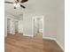 This bedroom offers hardwood floors and doorways to the bathroom, and walk-in closets at 709 Oakridge View Trl, Ridgeville, SC 29472