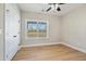 Bright bedroom with hardwood floors, a large window, and a closet at 709 Oakridge View Trl, Ridgeville, SC 29472