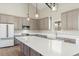 Well-equipped kitchen with large island, stainless steel appliances, and ample countertop space at 709 Oakridge View Trl, Ridgeville, SC 29472