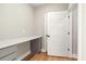 Neutral office space features built-in desk area and wood floors at 709 Oakridge View Trl, Ridgeville, SC 29472