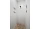 Clean, modern shower featuring white tile, and a round shower head at 709 Oakridge View Trl, Ridgeville, SC 29472