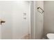 Shower features white tile, a glass shower door, and gold color fixtures at 709 Oakridge View Trl, Ridgeville, SC 29472