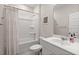 Clean, well-lit bathroom with a shower-tub combo and modern vanity with storage at 749 Jancus St, Charleston, SC 29414