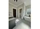 Bright bathroom boasts soaking tub, shower and double access, highlighting modern design at 85 Prestwick Pl, Walterboro, SC 29488