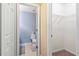View into small bathroom with toilet and closet at 8741 Grassy Oak Trl, North Charleston, SC 29420