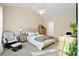 Cozy bedroom featuring a neutral color palette, plush bedding, and soft natural light at 8741 Grassy Oak Trl, North Charleston, SC 29420