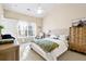 Inviting bedroom with soft natural light through a large window and neutral tones at 8741 Grassy Oak Trl, North Charleston, SC 29420