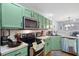 Bright kitchen featuring stainless steel appliances, plenty of counter space, and a functional layout at 8741 Grassy Oak Trl, North Charleston, SC 29420