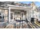 Covered patio with comfortable seating, perfect for outdoor relaxation and entertainment at 8741 Grassy Oak Trl, North Charleston, SC 29420