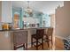 Kitchen with island, granite countertops and bar seating at 9394 Harroway Rd, Summerville, SC 29485