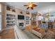 Open living area includes hardwood floors, fireplace and views of the kitchen at 9394 Harroway Rd, Summerville, SC 29485