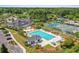 Aerial view highlighting the community pool, clubhouse, tennis courts, and manicured landscaping at 1032 Black Rush Cir, Mount Pleasant, SC 29466