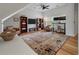 Spacious living room with high ceilings, hardwood floors, a patterned rug, and comfortable seating arrangements at 1032 Black Rush Cir, Mount Pleasant, SC 29466