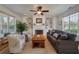 Bright living room with built-in shelves, a fireplace, and comfortable seating at 1032 Black Rush Cir, Mount Pleasant, SC 29466