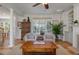 Cozy living room featuring hardwood floors, large windows, and comfortable seating at 1032 Black Rush Cir, Mount Pleasant, SC 29466