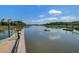 Scenic waterfront view with a kayak, docks, and lush greenery creating a tranquil atmosphere at 1032 Black Rush Cir, Mount Pleasant, SC 29466