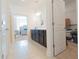 Bright bathroom with a double sink vanity and a view into the bedroom at 112 Edisto Crossing Ct, Ridgeville, SC 29472