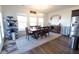 Bright dining room featuring a chandelier and large windows at 112 Edisto Crossing Ct, Ridgeville, SC 29472