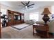 Comfortable living room featuring a large entertainment center, plush sofas, and ample natural light at 112 Edisto Crossing Ct, Ridgeville, SC 29472