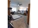 Cozy living room with comfortable seating, a ceiling fan, and an open layout at 112 Edisto Crossing Ct, Ridgeville, SC 29472