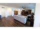 Spacious living room with wood floors, a ceiling fan, comfortable seating, and an open layout at 112 Edisto Crossing Ct, Ridgeville, SC 29472