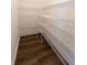 Walk-in pantry with adjustable wire shelving for organized storage at 112 Edisto Crossing Ct, Ridgeville, SC 29472