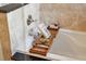 Relaxing bathroom features a soaking tub with wooden bath caddy at 1278 Deep Water Dr, Mount Pleasant, SC 29464