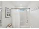Well-lit bathroom featuring a shower/tub combination with white shower curtain and chrome fixtures at 1278 Deep Water Dr, Mount Pleasant, SC 29464