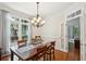 Traditional dining room with hardwood floors and elegant chandelier lighting at 1278 Deep Water Dr, Mount Pleasant, SC 29464