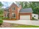 Charming two-story brick home featuring an attached garage and well-maintained landscaping at 1278 Deep Water Dr, Mount Pleasant, SC 29464