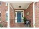 Charming blue front door with decorative glass and a cozy bench at 1278 Deep Water Dr, Mount Pleasant, SC 29464
