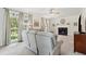 Spacious living room with a fireplace, large windows, and comfortable seating at 1278 Deep Water Dr, Mount Pleasant, SC 29464