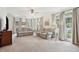 Bright living room with neutral decor, comfortable seating, and large windows at 1278 Deep Water Dr, Mount Pleasant, SC 29464