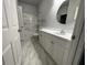 Bathroom featuring marble floors and subway tile at 1411 Telfair Way, Charleston, SC 29412