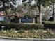 Welcoming entrance sign to Mira Vista at James Island amidst lush landscaping at 1411 Telfair Way, Charleston, SC 29412