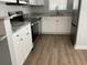 Well-appointed kitchen featuring stainless steel appliances and granite countertops at 1411 Telfair Way, Charleston, SC 29412