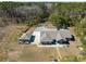 Aerial view of a beautiful home with a long driveway surrounded by mature trees at 1420 Polly Point Rd, Wadmalaw Island, SC 29487