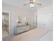 Comfortable bedroom with ensuite bath, dresser, and closet, creating a cozy and functional space at 1420 Polly Point Rd, Wadmalaw Island, SC 29487