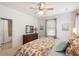 Cozy bedroom with floral bedding, wood dresser, and natural light, creating a warm and inviting space to rest at 1420 Polly Point Rd, Wadmalaw Island, SC 29487