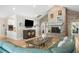 Spacious living room featuring a brick fireplace, and an open floor plan at 1420 Polly Point Rd, Wadmalaw Island, SC 29487