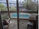 Relaxing view of the pool from the balcony at 1530 Fort Johnson Rd # 3F, Charleston, SC 29412