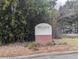 Community sign with brick base surrounded by greenery, marking the entrance to Brigadier Condominiums at 1530 Fort Johnson Rd # 3F, Charleston, SC 29412