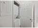 Convenient in-unit laundry closet with stacked washer and dryer at 1530 Fort Johnson Rd # 3F, Charleston, SC 29412