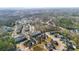 Beautiful aerial view of real estate showcasing a pond and well-manicured lawns at 1532 Roustabout Way, Charleston, SC 29414