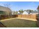 A spacious, fenced-in backyard offering privacy and room for outdoor activities and landscaping at 1532 Roustabout Way, Charleston, SC 29414