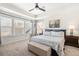 Bright bedroom featuring tray ceilings, neutral carpet, and light color walls with lots of natural light at 1532 Roustabout Way, Charleston, SC 29414