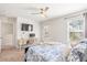 Bedroom featuring a desk, neutral carpet, light color walls, a ceiling fan, and a door to the outdoor terrace at 1532 Roustabout Way, Charleston, SC 29414